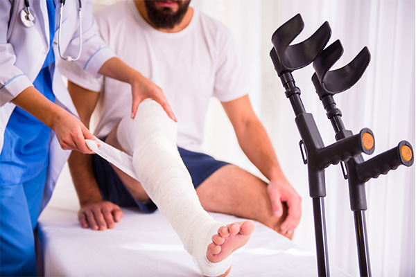man-in-doctor-office-with-injury-from-product man-in-doctor-office-with-injury-from-product